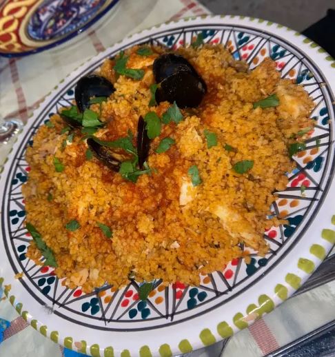 cous cous Trapani, dove mangiare il cous cous a Trapani, piatto di cous cous con pesce del ristorante Carthage